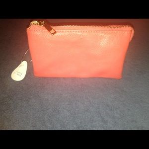 Small pink clutch